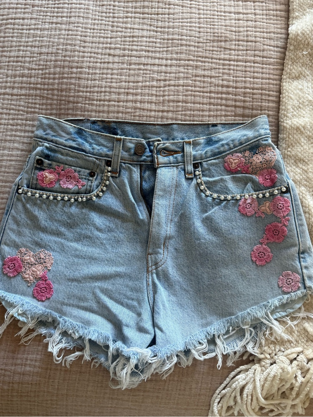 LoveShackFancy Bespoke Levi’s Light Blue Denim Shorts with Pink Floral Appliqué